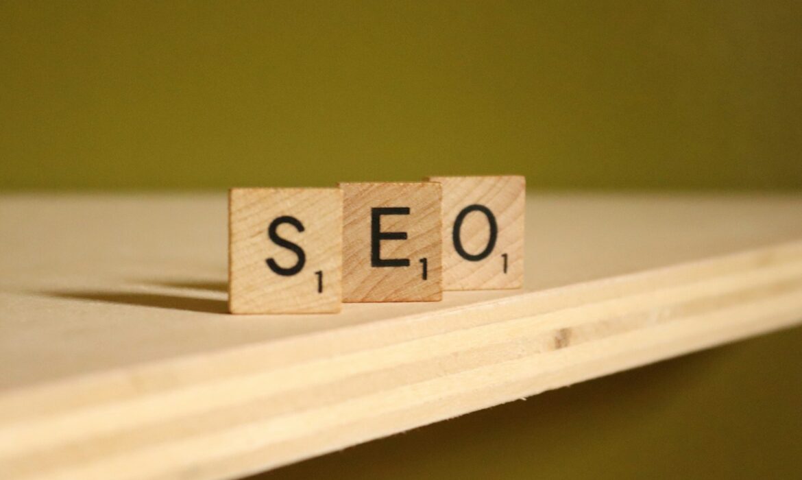 a wooden block that says seo on it